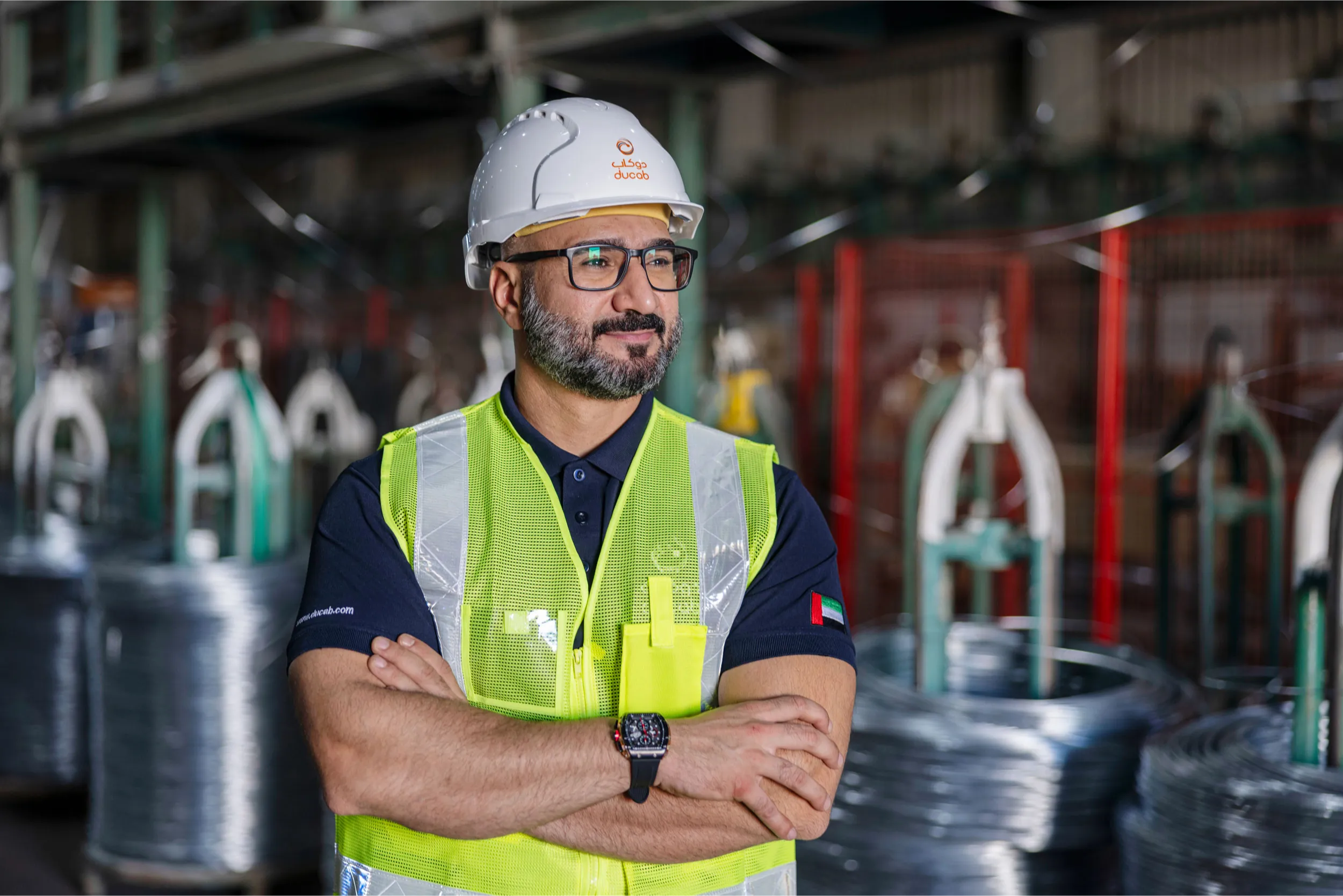 Ducab employee demonstrating workplace health and safety gear